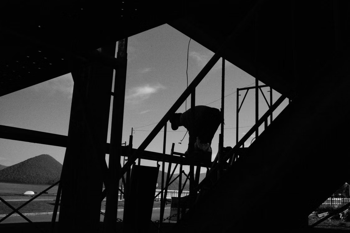 Silhouette of a construction site against the sky
